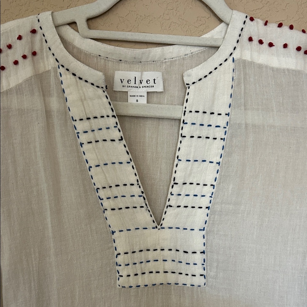 Velvet White Tunic with Blue Stitching and Red Accents